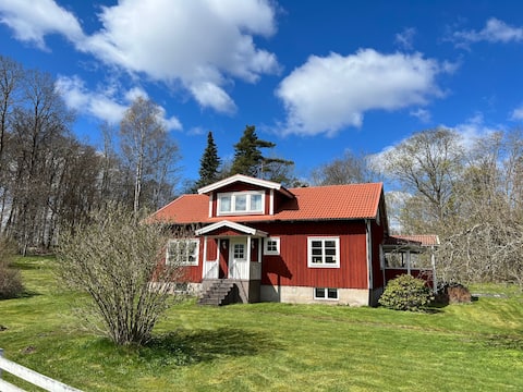 House on a farm near lake, forest and the city of Växjö
