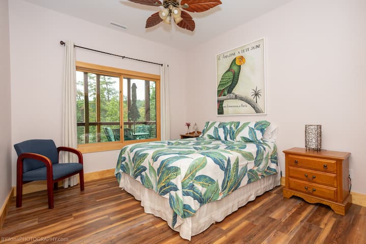 2nd bedroom with a view of the lake and your deck.