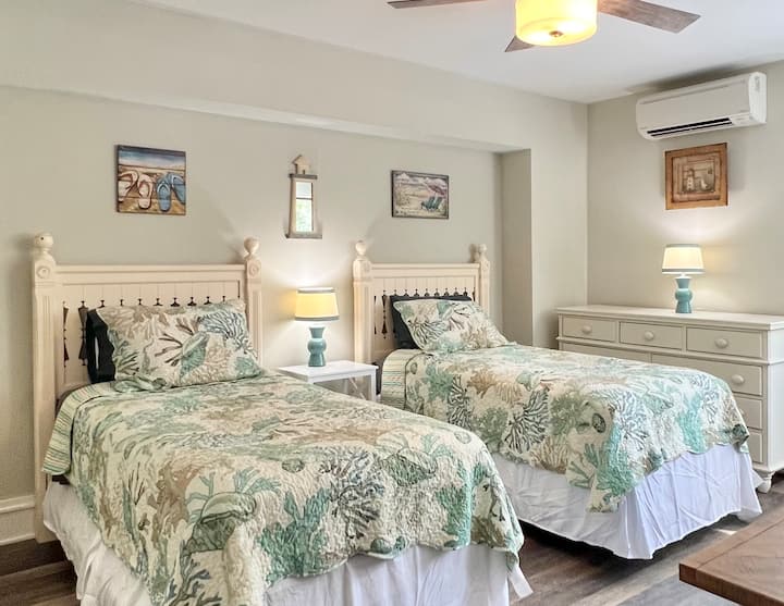 Two twin beds and dedicated full bathroom