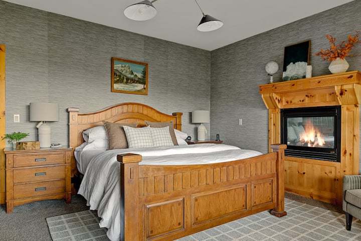 Master Bedroom with king bed and full bathroom and cozy fireplace