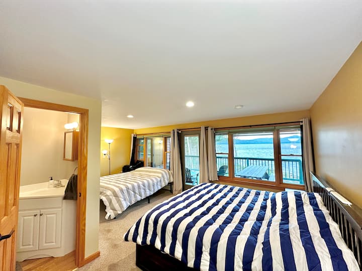 Master bedroom- king bed and queen bed 1/2 bath - water views