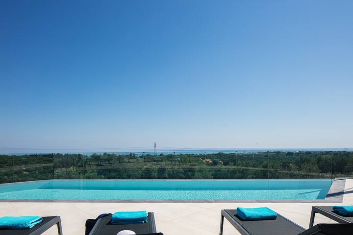 Sea views, hot tub, private pool & modern design! gallery image 3