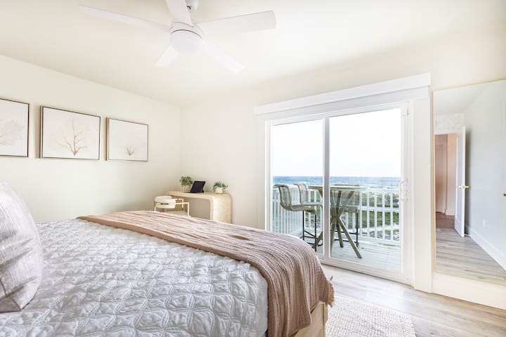 The master bedroom has it's own private deck with views.