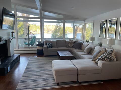 Newly listed lake house w/ dock, beach, water view
