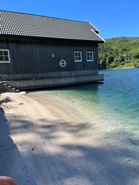 Cabin with dock at sea