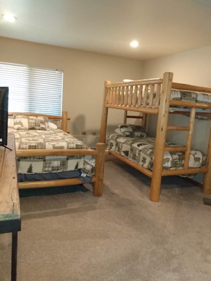 Guest room #5 with one queen and one bunkbed shared bath with #4