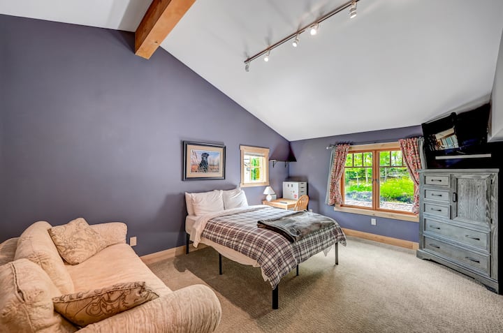 Sixth bedroom, with bed and couch