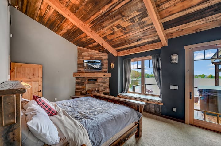 Main master bedroom suite with private door to/from the hot tub and deck