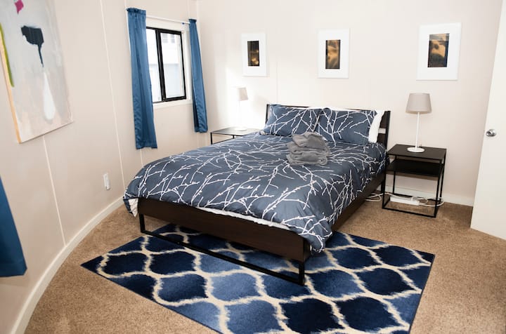 Primary bedroom with a Queen-sized bed (second floor). The window has a view of the lake!