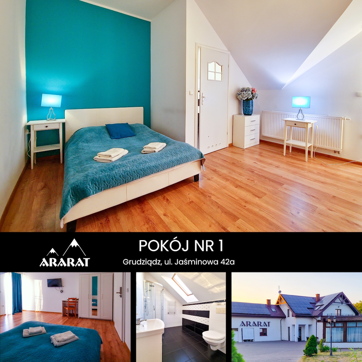 A well-lit guest room features a spacious bed with neatly arranged towels on top. A bedside table with a blue lamp provides soft illumination. A chest of drawers and a window contribute to the airy ambiance, with wooden flooring adding warmth to the space.