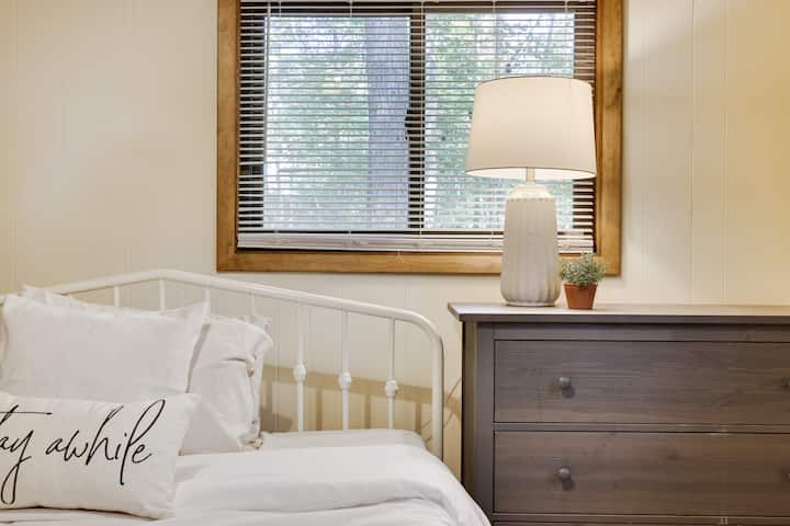 Specious downstairs bedroom with designated work space and high speed internet. 