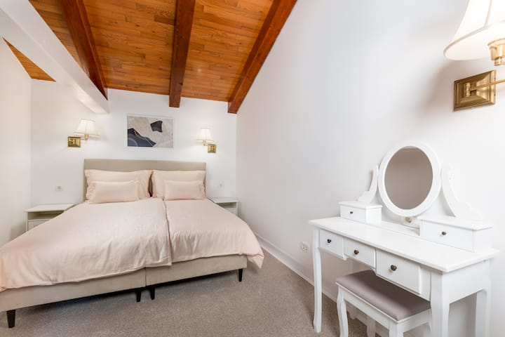 The villa’s largest bedroom offers a spacious and peaceful retreat, designed for ultimate comfort and relaxation.