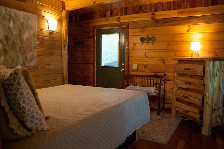 There is a queen size bed (memory foam) and attached bathroom in the main floor bedroom.