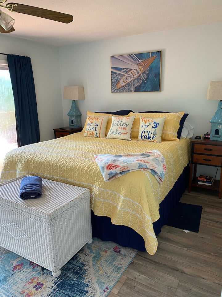 Bedroom two with access to back deck.
