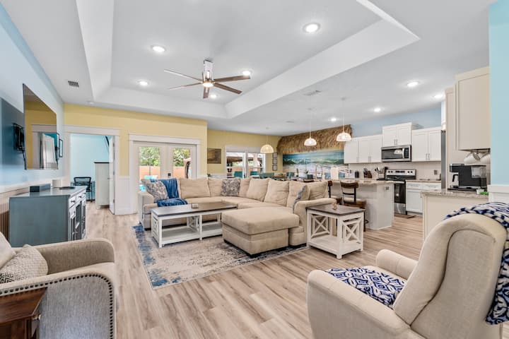 Living room has a big sectional with a queen size pull out bed