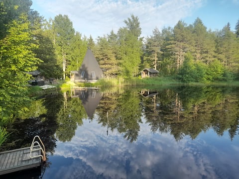 Log cabin by the shore of your own pond