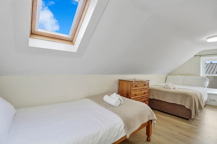 Twin room with single and small double beds