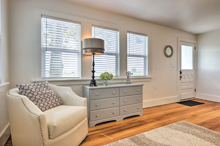 The front room is located right off the front porch and leads to the family room through a barn door made from one of the original doors that came with the home.