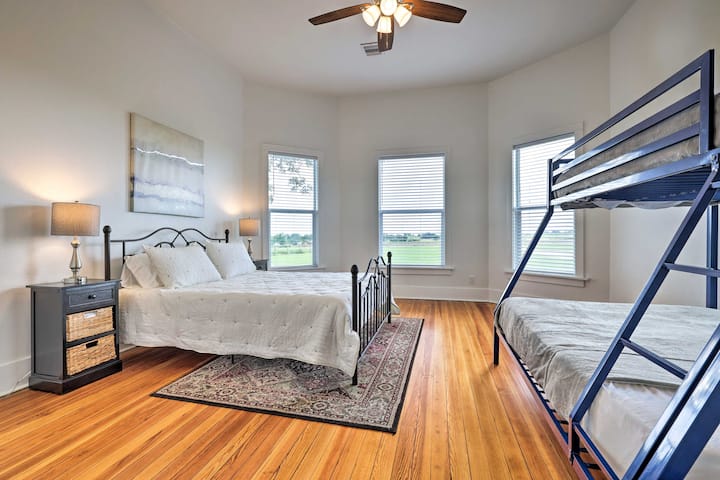 The other guest room has a queen bed and full/twin bunk bed. Both bedrooms down have a full closet with hangers and luggage valet. An Iron and ironing board is also provided. A dresser has also been added to this bedroom.