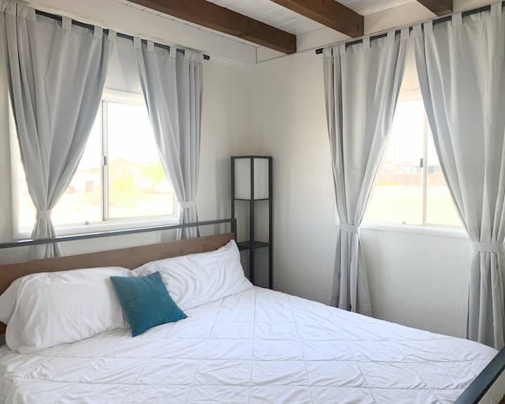 The second ground level bedroom has it's own king sized foam mattress for the kids or your friends who are exploring with you. 