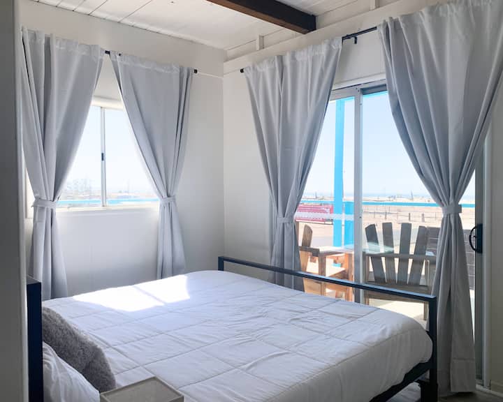 Wake up to the breath taking views from the the master king foam mattress bedroom which looks out onto the Salton Sea with 360 degree views. 
