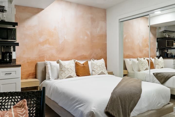 Bedroom 5 with Queen bed and pullout Couch bed, ensuite bathroom. Off of gameroom with private door to lower patio. 