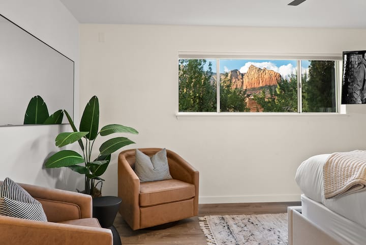 Primary Bedroom 1. King bed, ensuite bathroom, private door to deck,  Red Rock views.