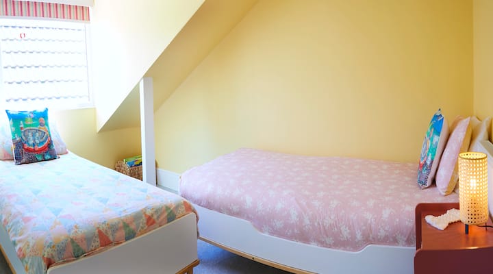 Second floor bedrooms with two single beds