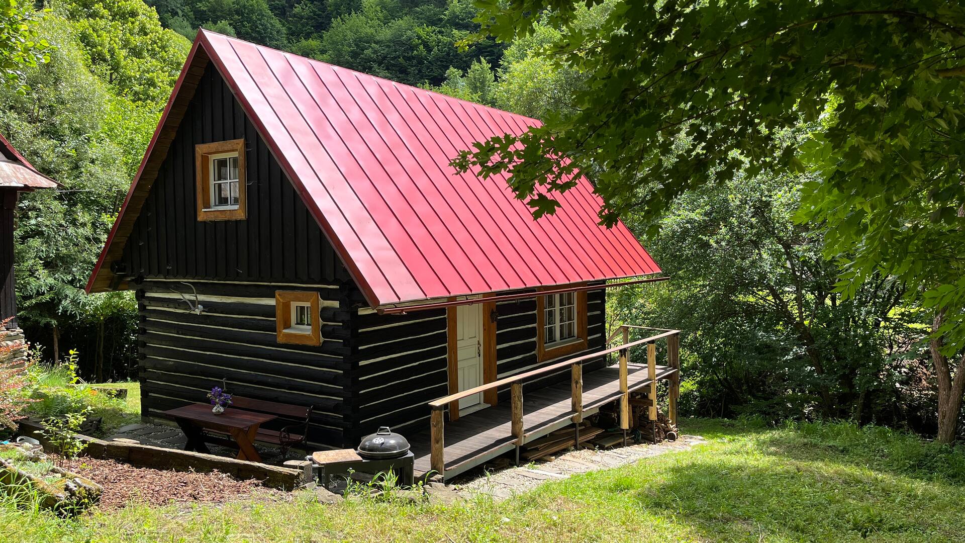 Wooden house by the stream