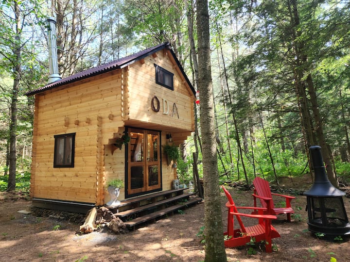 "Oda" Log Cabin with Cedar Hot Tub & Sauna on wood