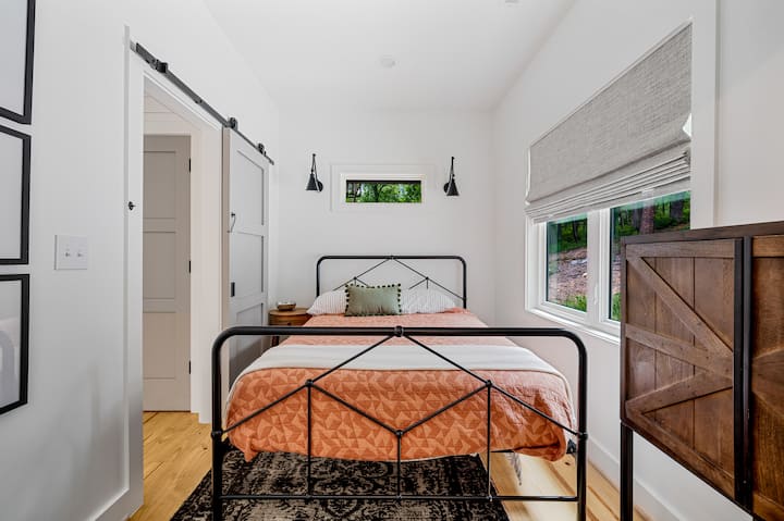 First floor queen bedroom with attached private bath
