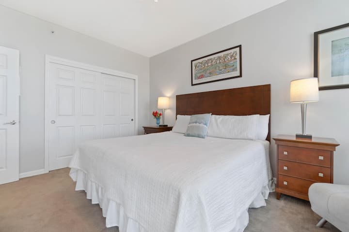 Second Guest Suite boosts a King Bed, private balcony access, Large closet, and smart TV