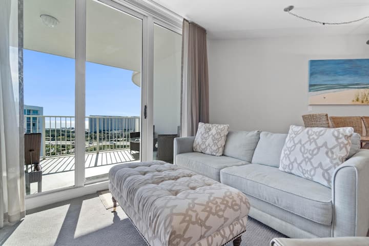 Spacious and comfy living room space with queen sofa sleeper.  Gulf and Lagoon Pool views.