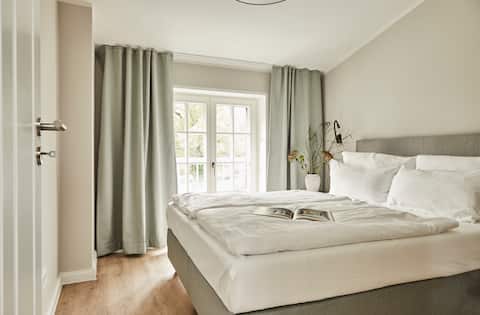 Beach happiness wellness suite with steam bath and balcony