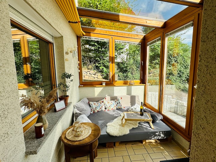 In-law apartment with a cozy conservatory