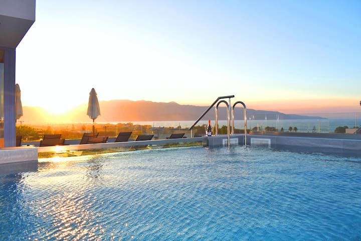 Naval villa-Panoramic villa with heated roof pool