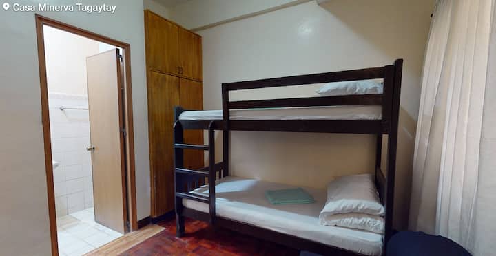 Ground floor bedroom with en suite toilet and bath