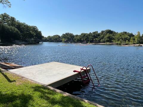Shaded riverfront getaway. Dog friendly