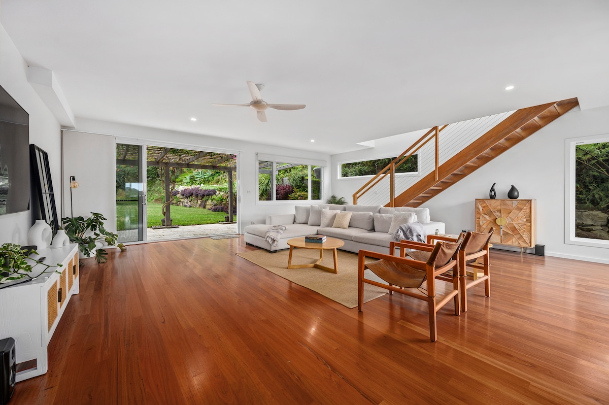 Popular Airbnb listing: Tranquil Treetop Haven: 3BR Home w/ Stunning Views in Coffs Harbour City Council