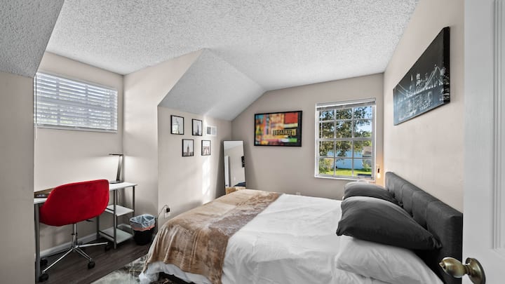 Stylish and functional, this room captures the essence of New York with its chic decor and comfortable setting.