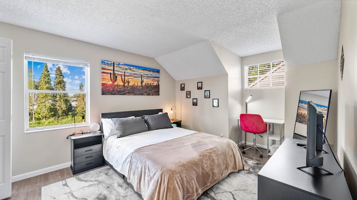 Bright and airy, this room combines comfort with a touch of Southwestern charm, complete with modern amenities.