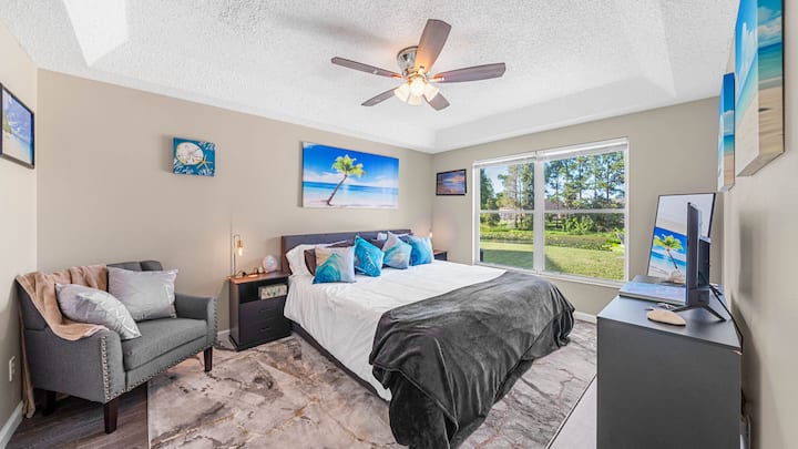 Luxurious and spacious, the master bedroom offers a serene retreat with direct access to the opulent ensuite bathroom.