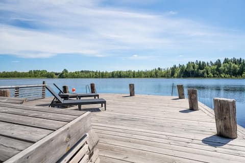 Modern lakehouse with dock