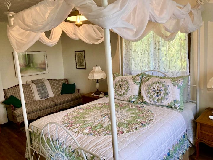 The master bedroom  suite off the living room. 