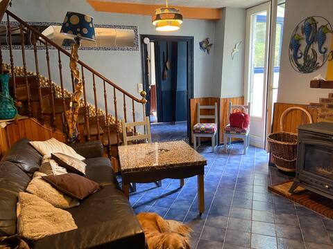 House between mountains and sea