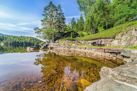 Cabin in Seljord with beach and private motorboat