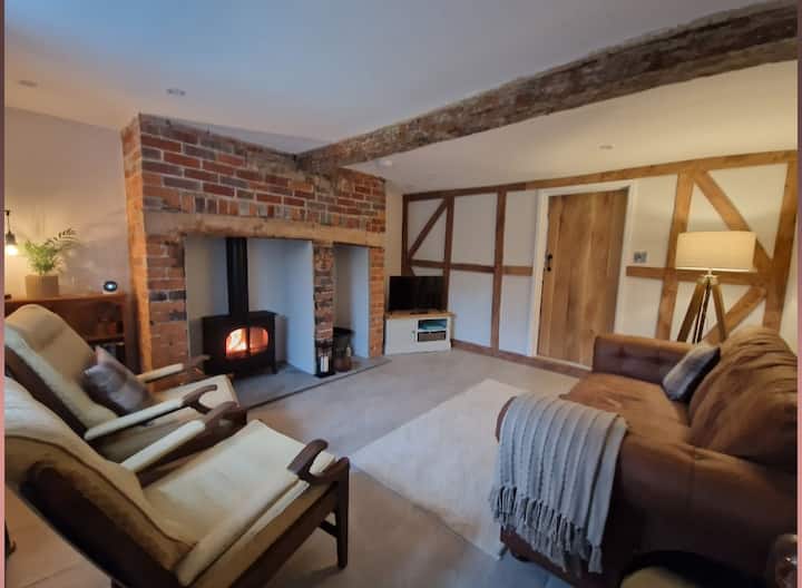Cosy cottage with log burner in peaceful village