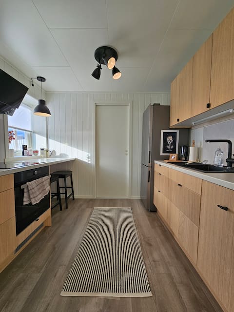 New and modern with great view, by the center.