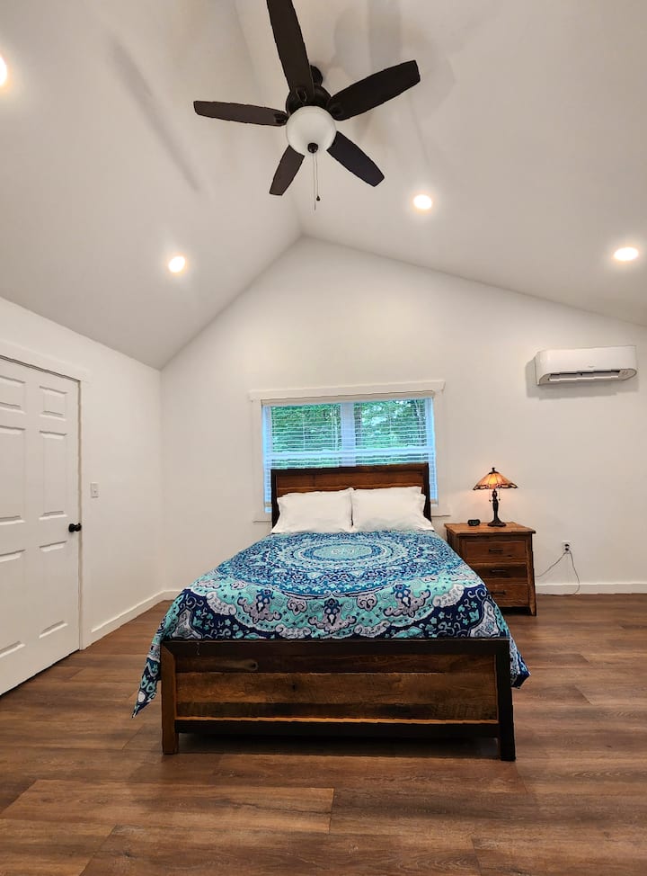 Upstairs main bedroom 2 with queen bed