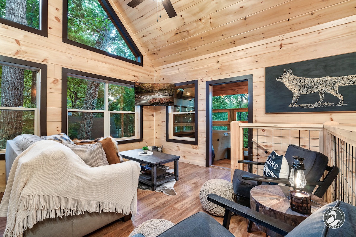 Living room features a queen-sized sleeper sofa with memory foam.